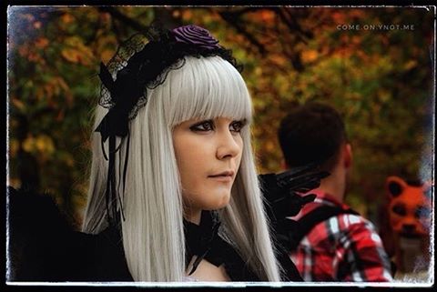 1girl bangs blurry closed_mouth depth_of_field letterboxed long_hair silver_hair solo suigintou
