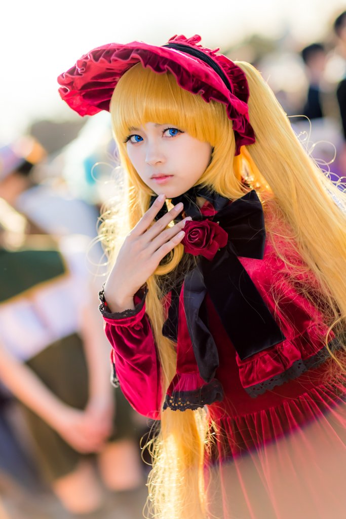 1girl bangs blonde_hair blue_eyes blurry blurry_background depth_of_field dress flower frills gothic_lolita lips lolita_fashion long_hair photo realistic red_flower red_rose rose shinku solo