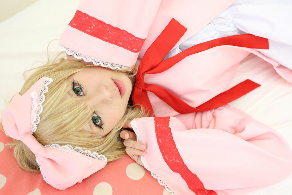1girl blonde_hair bow green_eyes hair_bow hina_ichigo hinaichigo lips looking_at_viewer ribbon solo