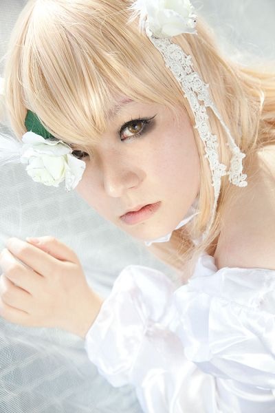 1girl blonde_hair choker hair_ornament kirakishou lips looking_at_viewer solo