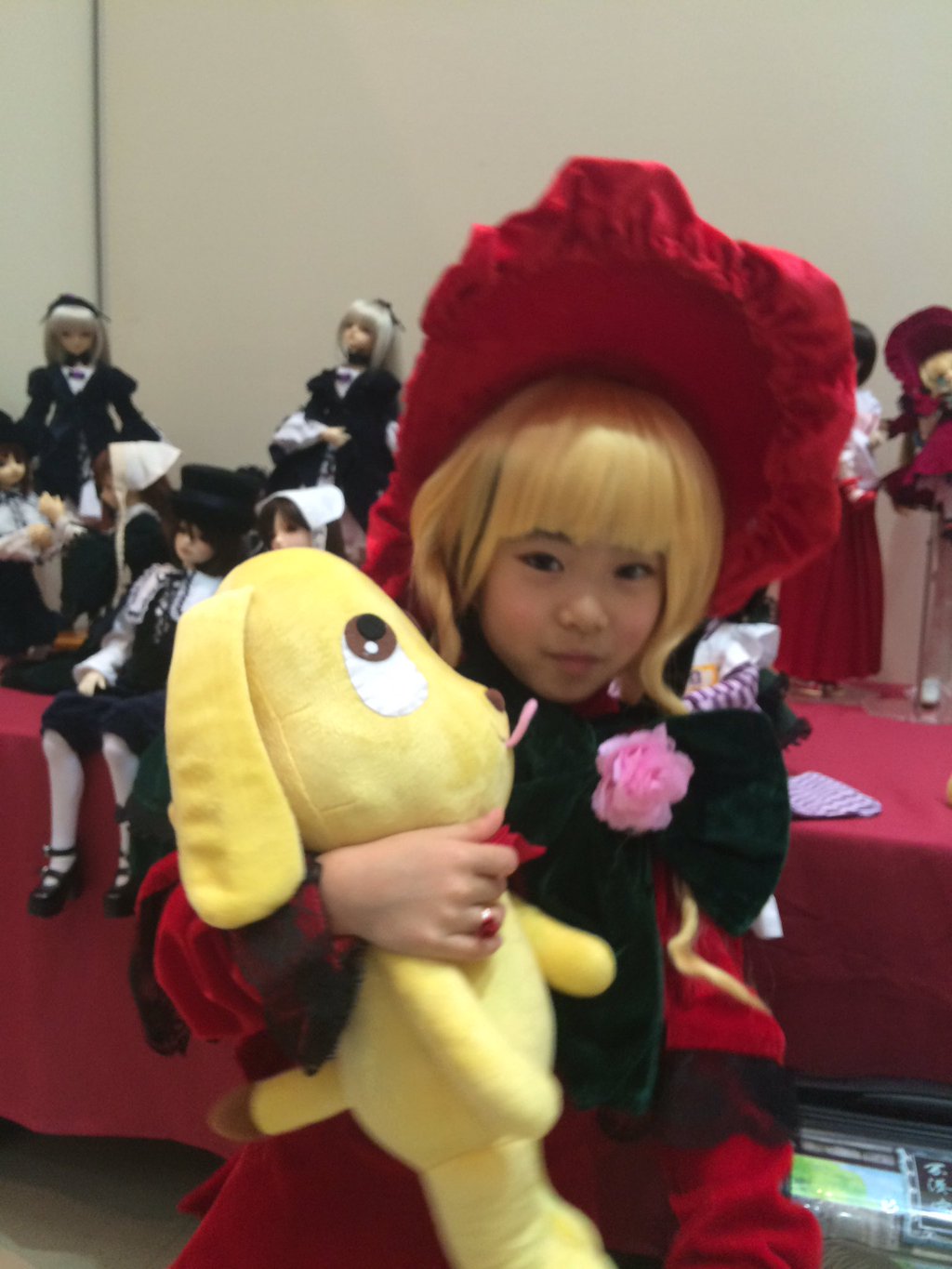 blonde_hair blurry depth_of_field dress flower hat multiple_girls photo shinku short_hair solo stuffed_animal