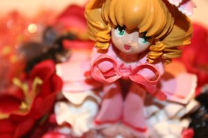 Rating: Safe Score: 0 Tags: 1girl blonde_hair blurry blurry_background blurry_foreground depth_of_field doll dress drill_hair figure flower frills hina_ichigo hinaichigo looking_at_viewer motion_blur open_mouth photo pink_dress ribbon sitting smile solo twin_drills twintails User: admin