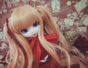 Rating: Safe Score: 0 Tags: 1girl bangs blonde_hair blue_eyes blurry blurry_foreground card depth_of_field doll dress long_hair looking_at_viewer photo_(object) playing_card ribbon shinku smile solo twintails upper_body very_long_hair User: admin