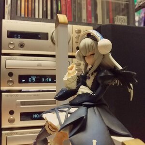 Rating: Safe Score: 0 Tags: 1girl bangs bookshelf closed_eyes doll dress long_hair long_sleeves solo suigintou white_hair User: admin