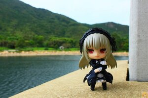 Rating: Safe Score: 0 Tags: 1girl black_dress blonde_hair blurry blurry_background chibi day depth_of_field doll dress frills hairband lolita_hairband long_hair long_sleeves looking_at_viewer outdoors photo red_eyes smile solo standing suigintou wings User: admin