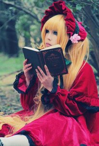 Rating: Safe Score: 0 Tags: 1girl bangs blonde_hair blue_eyes blurry bonnet book dress flower forest holding lips long_hair long_sleeves nature realistic red_dress shinku solo User: admin