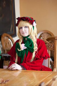 Rating: Safe Score: 0 Tags: 1girl blonde_hair blue_eyes bonnet bow dress flower long_hair long_sleeves photo realistic red_dress shinku sitting solo User: admin