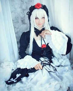 Rating: Safe Score: 0 Tags: 1girl black_dress dress flower frills gothic_lolita lolita_fashion long_hair long_sleeves looking_at_viewer red_flower rose solo suigintou white_hair User: admin