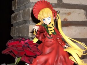 Rating: Safe Score: 0 Tags: 1girl bangs blonde_hair blue_eyes bonnet bow bowtie capelet doll dress frills long_hair long_sleeves looking_at_viewer red_dress shinku solo standing twintails very_long_hair User: admin