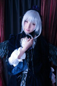 Rating: Safe Score: 0 Tags: 1girl closed_mouth curtains dress feathers frills gothic_lolita hairband lolita_fashion long_sleeves looking_at_viewer red_eyes smile solo suigintou User: admin