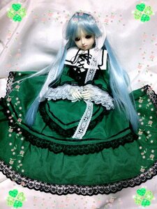 Rating: Safe Score: 0 Tags: 1girl doll dress flower frills green_dress long_sleeves looking_at_viewer ribbon short_hair sitting solo suiseiseki User: admin