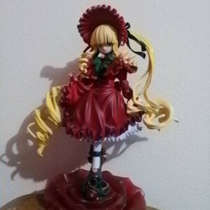 Rating: Safe Score: 0 Tags: 1girl blonde_hair bonnet bow doll dress drill_hair frills full_body long_hair long_sleeves red_dress shinku solo standing very_long_hair User: admin