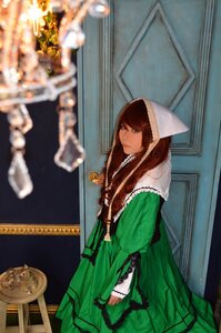 Rating: Safe Score: 0 Tags: 1girl blue_eyes blurry blurry_background blurry_foreground brown_hair depth_of_field dress green_dress green_eyes hood long_hair looking_at_viewer photo solo standing suiseiseki User: admin