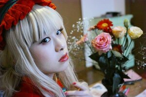 Rating: Safe Score: 0 Tags: 1girl bangs blue_eyes blurry blurry_foreground depth_of_field flower lips photo rose shinku solo User: admin