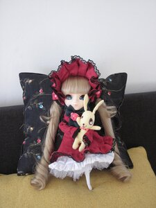 Rating: Safe Score: 0 Tags: 1girl blonde_hair blue_eyes bonnet bow doll dress long_hair shinku sitting solo stuffed_animal very_long_hair User: admin