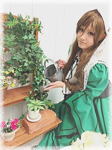Rating: Safe Score: 0 Tags: 1girl blonde_hair cup dress flower flower_pot green_dress long_hair plant potted_plant sitting solo suiseiseki table teacup watering_can User: admin