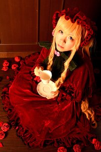 Rating: Safe Score: 0 Tags: 1girl blonde_hair blue_eyes bonnet cup dress flower gothic_lolita holding_cup lips lolita_fashion long_hair looking_at_viewer red_dress red_flower red_rose rose shinku sitting solo tea teacup User: admin