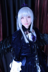 Rating: Safe Score: 0 Tags: 1girl black_wings dress feathers frills gothic_lolita hairband lips lolita_fashion long_hair long_sleeves looking_at_viewer pale_skin silver_hair solo suigintou wings User: admin