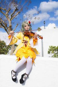 Rating: Safe Score: 0 Tags: 1girl cloud day dress flower hair_flower hair_ornament instrument kanaria music outdoors playing_instrument sitting sky solo tree white_legwear yellow_dress User: admin