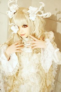 Rating: Safe Score: 0 Tags: 1girl bangs blonde_hair blurry dress flower frills hair_flower hair_ornament kirakishou lace lips long_hair long_sleeves looking_at_viewer solo white_flower yellow_eyes User: admin