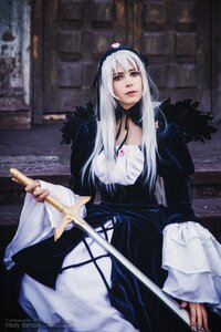 Rating: Safe Score: 0 Tags: 1girl bangs dress hairband holding lips long_hair long_sleeves looking_at_viewer solo standing suigintou User: admin