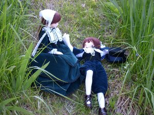 Rating: Safe Score: 0 Tags: 1boy 1girl bangs brown_hair cloak doll dress grass holding holding_umbrella long_sleeves multiple_dolls nature on_ground outdoors pants sitting tagme umbrella User: admin