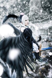 Rating: Safe Score: 0 Tags: 1girl black_wings blurry depth_of_field dress feathered_wings feathers frills snow solo suigintou white_hair wings User: admin