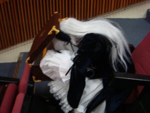 Rating: Safe Score: 0 Tags: 1boy blurry depth_of_field kiss long_hair long_sleeves solo suigintou User: admin