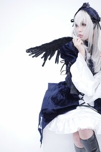 Rating: Safe Score: 0 Tags: 1girl black_wings boots dress frills hairband long_hair long_sleeves ribbon silver_hair solo suigintou wings User: admin