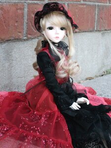 Rating: Safe Score: 0 Tags: 1girl black_dress blonde_hair bonnet doll dress expressionless hat long_hair long_sleeves looking_at_viewer photo red_dress shinku sitting solo traditional_media User: admin