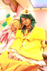 Rating: Safe Score: 0 Tags: 2girls blonde_hair closed_eyes dress flower green_hair hair_flower hair_ornament multiple_cosplay multiple_girls short_hair tagme yellow_dress User: admin