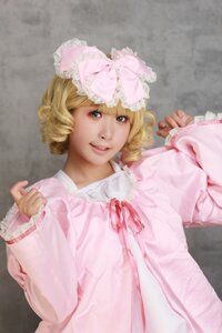 Rating: Safe Score: 0 Tags: 1girl blonde_hair blurry bow curly_hair depth_of_field frills hina_ichigo hinaichigo lips long_sleeves looking_at_viewer nose pink_bow realistic ribbon short_hair smile solo upper_body User: admin
