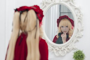 Rating: Safe Score: 0 Tags: 1girl blonde_hair blue_eyes blurry blurry_background blurry_foreground bonnet depth_of_field dress long_hair reflection shinku solo User: admin