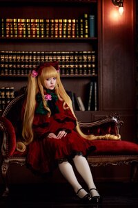 Rating: Safe Score: 0 Tags: 1girl blonde_hair blue_eyes bookshelf bow chair dress flower lips lolita_fashion long_hair looking_at_viewer red_dress rose shinku sitting solo twintails very_long_hair User: admin