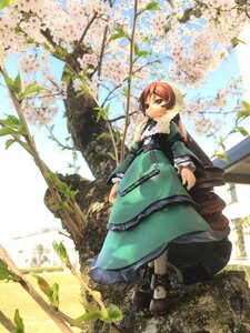 Rating: Safe Score: 0 Tags: 1girl blue_sky brown_eyes brown_hair cloud day doll dress green_dress long_hair outdoors sky solo suiseiseki tree User: admin