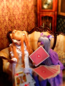Rating: Safe Score: 0 Tags: 2girls blurry blurry_foreground depth_of_field dress hair_bobbles hair_flower hair_ornament long_hair multiple_cosplay multiple_girls silver_hair sitting tagme twintails User: admin