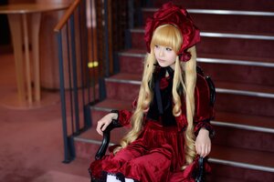 Rating: Safe Score: 0 Tags: 1girl bangs blonde_hair blue_eyes blurry bonnet depth_of_field dress flower long_hair looking_at_viewer red_dress shinku sitting solo twintails User: admin