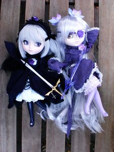 Rating: Safe Score: 0 Tags: 2girls doll dress flower frills long_hair multiple_dolls multiple_girls purple_eyes standing tagme weapon white_hair wings User: admin