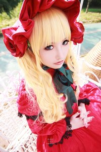 Rating: Safe Score: 0 Tags: 1girl bangs blonde_hair blue_eyes bonnet dress eyelashes flower lace lips lolita_fashion long_hair looking_at_viewer own_hands_together red_dress shinku solo upper_body User: admin