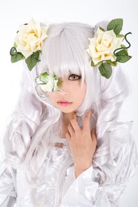 Rating: Safe Score: 0 Tags: 1girl bangs eyepatch flower hair_flower hair_ornament kirakishou lace lips long_hair long_sleeves looking_at_viewer one_eye_covered red_lips rose solo upper_body white_flower white_hair white_rose yellow_eyes User: admin