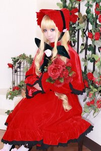 Rating: Safe Score: 0 Tags: 1girl blonde_hair blue_eyes bonnet dress flower long_hair looking_at_viewer red_dress red_flower red_rose rose shinku sitting solo traditional_media User: admin