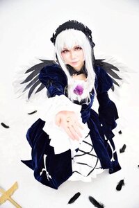 Rating: Safe Score: 0 Tags: 1girl black_wings dress feathers frills hairband long_hair long_sleeves looking_at_viewer red_eyes ribbon solo suigintou wings User: admin