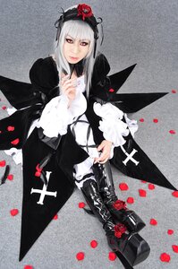 Rating: Safe Score: 0 Tags: 1girl dress flower gothic_lolita hairband lolita_fashion long_hair petals red_eyes rose rose_petals solo suigintou User: admin