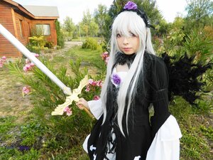 Rating: Safe Score: 0 Tags: 1girl dress flower grass hairband lips long_hair looking_at_viewer purple_flower red_eyes solo suigintou tree weapon User: admin