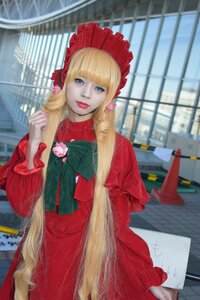 Rating: Safe Score: 0 Tags: 1girl bangs blonde_hair blue_eyes blurry blurry_background bonnet depth_of_field dress long_hair photo red_dress shinku solo standing very_long_hair User: admin