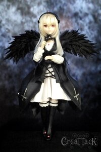 Rating: Safe Score: 0 Tags: 1girl auto_tagged black_wings blonde_hair blurry blurry_background boots cross depth_of_field doll dress feathered_wings feathers frills full_body hairband long_hair long_sleeves looking_at_viewer red_eyes ribbon solo standing suigintou wings User: admin