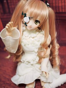 Rating: Safe Score: 0 Tags: 1girl bangs blonde_hair blurry blurry_foreground depth_of_field doll dress eyepatch green_eyes kirakishou lips long_hair long_sleeves looking_at_viewer sitting solo twintails very_long_hair white_dress User: admin