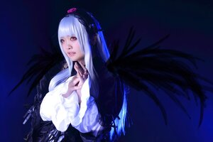 Rating: Safe Score: 0 Tags: 1girl bangs black_wings blue_background breasts feathered_wings frills hairband lips lolita_fashion long_hair long_sleeves looking_at_viewer red_eyes solo suigintou upper_body wings User: admin