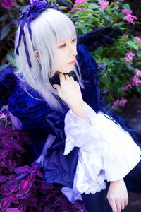 Rating: Safe Score: 0 Tags: 1girl bangs blunt_bangs blurry closed_eyes closed_mouth depth_of_field eyelashes flower hair_ribbon long_hair long_sleeves ribbon solo suigintou User: admin