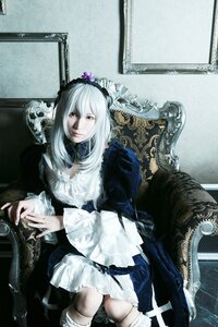 Rating: Safe Score: 0 Tags: 1girl chair couch dress frills gothic_lolita long_hair long_sleeves sitting solo suigintou User: admin
